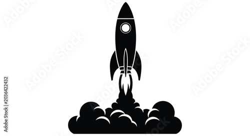 Photos A black silhouette of a rocket launching with fiery exhaust plumes