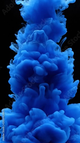 Blue Ink Cloud Dissolves Slowly Downwards.