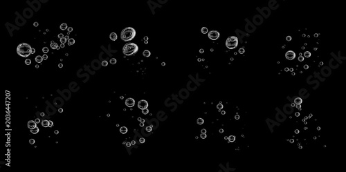 set bubbles rising to the water's surface isolated on a black background. drop air in water flowing up, underwater, clear liquid. water bubble white oxygen air