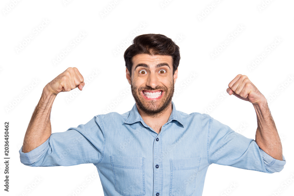 Fototapeta premium Sport is my life! Photo of amazing handsome guy raising arm showing perfect biceps wear casual denim shirt isolated white color background