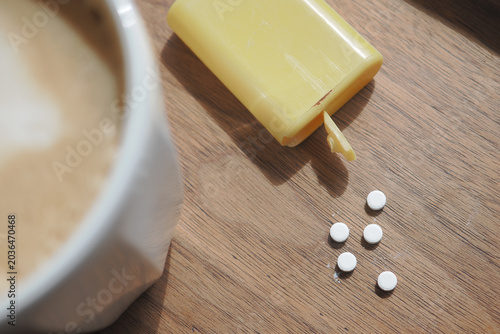 Tableau sur toile Coffee with sweetener sugar on a table