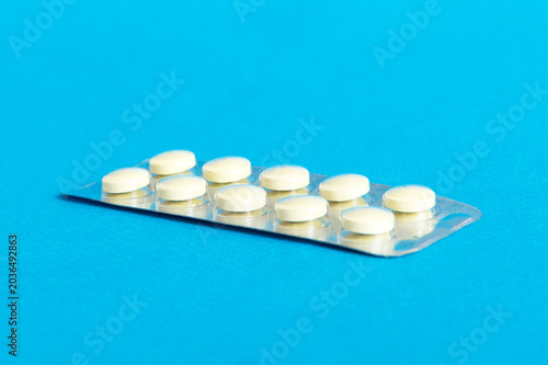 Obraz na płótnie Blister package with Vitamin on color background