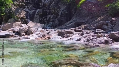 In the woods, immersed in nature. Above and below the water. Pristine nature and crystal-clear waters. Torre Torre in Friuli.