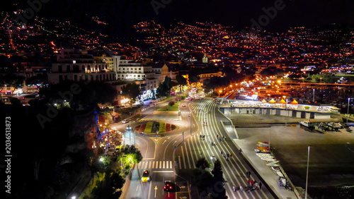 Tableau sur toile Panoramic drone perspective of Funchal showing the main oceanfront highway, city