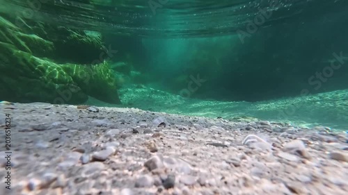 In the woods, immersed in nature. Above and below the water. Pristine nature and crystal-clear waters. Torre Torre in Friuli.