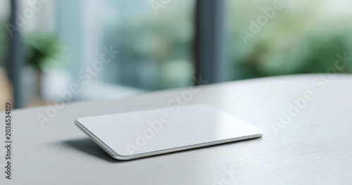 Modern tablet device on white table