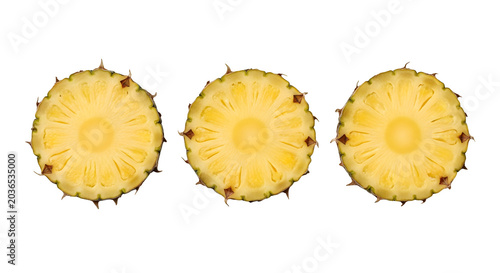 Fresh pineapple slices on black background
