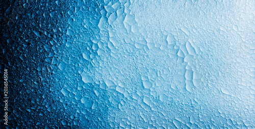 blue ice crystal texture with crystalline frozen surface structure