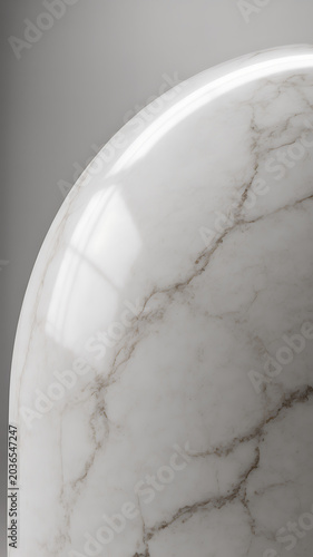 Closeup of a white marble surface with brown veins on a gray background
