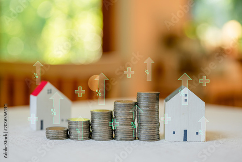 Concepts of saving and investing. Investing in houses and land. Growth of the real estate business. House and land taxes. Banks and home loans.