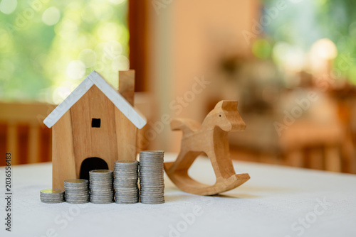 Concepts of saving and investing. Investing in houses and land. Growth of the real estate business. House and land taxes. Banks and home loans.