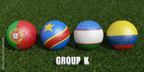  soccer balls in flags colors on soccer field .  3d rendering of group K