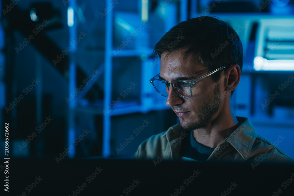 Fototapeta premium Software Developer Coding Application Interface In Modern Programming Workspace During Night Shift Backend Development And Computer Engineering Session