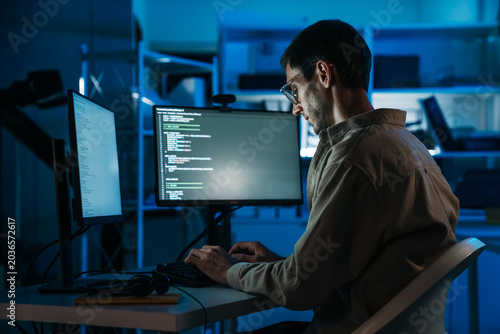 Software Developer Coding Application Interface In Modern Programming Workspace During Night Shift Backend Development And Computer Engineering Session