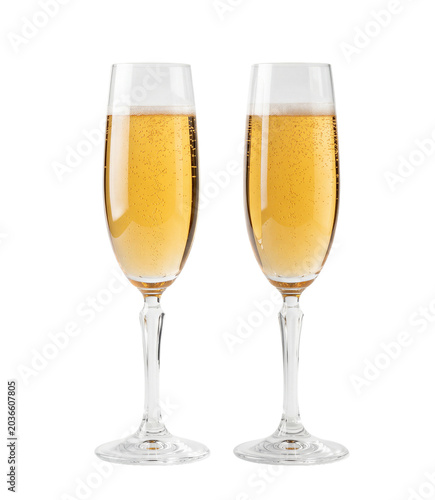 Two Champagne Flutes Filled with Sparkling Champagne