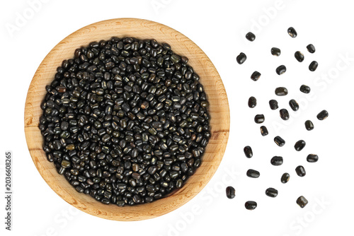 Fotografie Black bean or Urad dal, black gram, vigna mungo in wooden bowl isolated on the white background