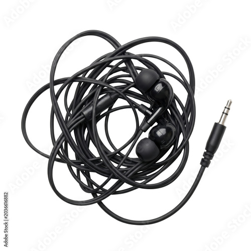 Fotografie Tangled black wired earphones with audio jack isolated