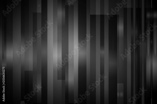 An abstract dark background. Glowing grey striped texture.