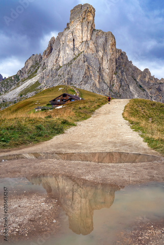 Hiking on the top of Giau pass in the Dolomite Alps, Italy