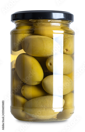 Cerignola olives with pits in glass jar with screw cap. Known as Bella di Cerignola, whole, large premium Italian table olives, picked when they are still unripe, preserved in brine. Front view. Photo