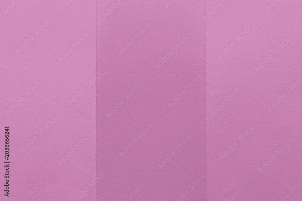 Fototapeta premium A textured pink paper background with three vertical sections.