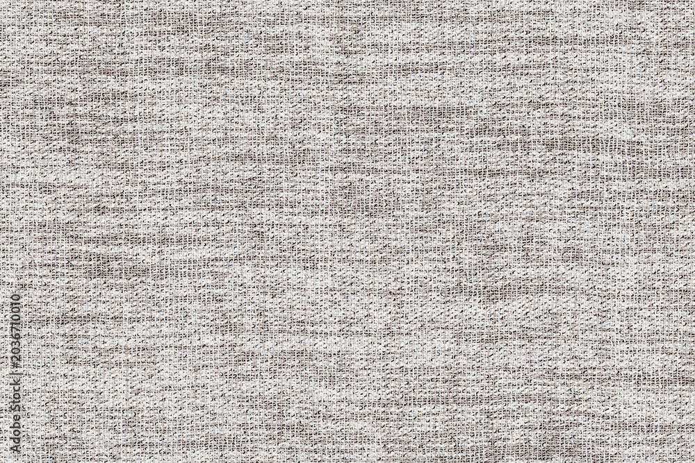 Fototapeta premium Textured fabric background in light gray with a woven, linen-like appearance