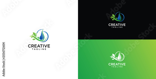 Elegant abstract liquid drop with fresh green leaves concept icon for natural product branding or wellness company identity design element