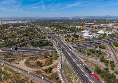 Konstfotografi Aerial view of a multilane cloverleaf highway interchange near Valencia, Spain,