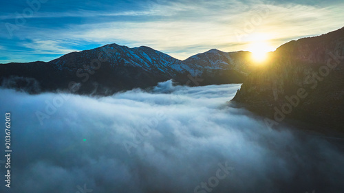 Photography Aerial Mt Charleston Cloud Inversion Sunburst Over Mountains At Golden Hour