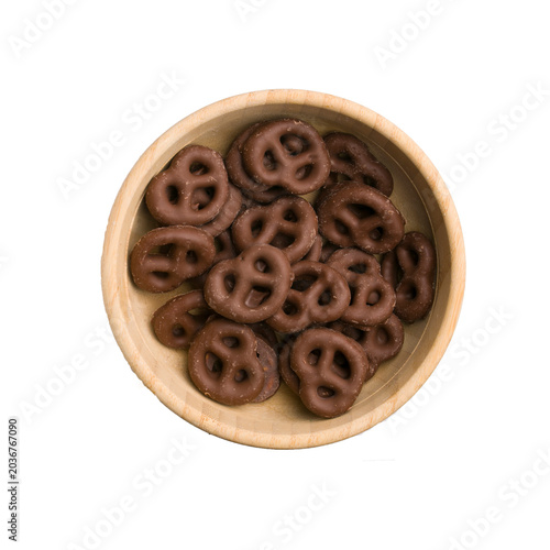 Wooden bowl with chocolate pretzels
