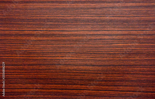 Mahogany mahogany texture.Vintage wooden text background.Expensive material for finishing antique furniture.