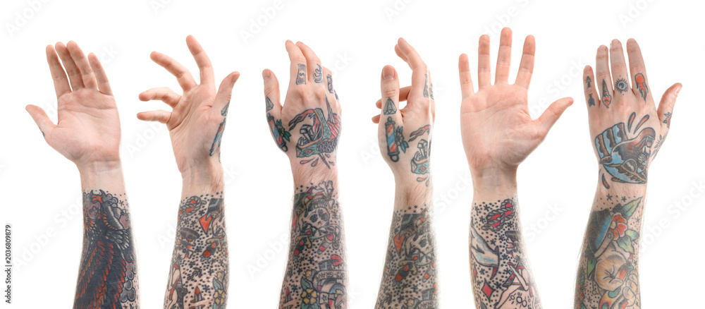 Fototapeta premium Man showing his tattooed hands on white background, set