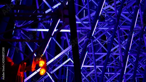 Fotografie Ferris wheel structure lit up at night