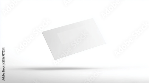 An elegant business card floating in mid-air against a clean, minimalist white background.
