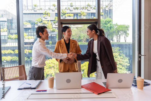 Group colleagues in office having casual discussion during meeting in conference room.teamwork concepts.