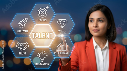 Businesswoman interacting with holographic talent management framework for focus value performance innovation trust and growth in human capital development and workforce strategy and HR