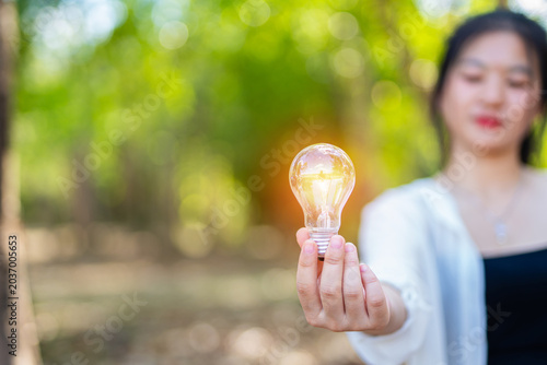 light bulb against nature, icons