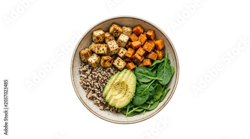Bowl of healthy vegetarian food with quinoa tofu sweet potato avocado and spinach on a transparent background PNG file