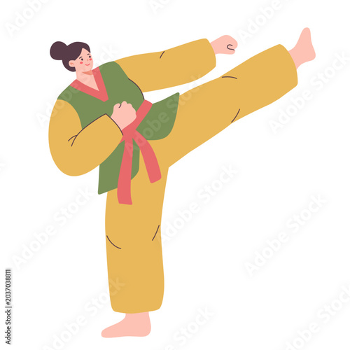 Photography Martial Arts Warrior: A woman in a martial arts uniform performs a dynamic kick, showcasing discipline, strength, and agility in a powerful stance