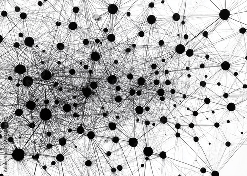 Abstract network of black dots and connecting lines on white background. Complex web suggests data, connections, or systems. Minimalist design enhances modern digital or scientific themes