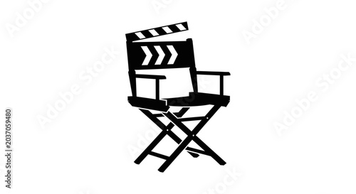 Φωτογραφία Silhouette of a folding movie director's chair with clapperboard on top