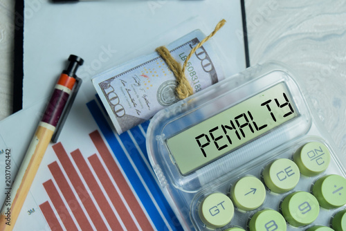 Penalty text on calculator. Financial, economy and business concept