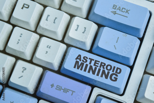 Foto Asteroid mining on the button keyboard