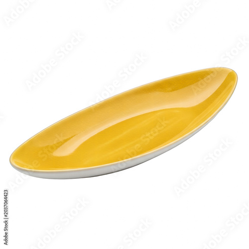 Yellow oval serving dish on a black background