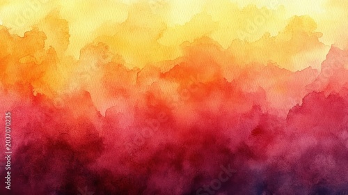 Vibrant watercolor wash abstract background with warm orange yellow and red hues transitioning