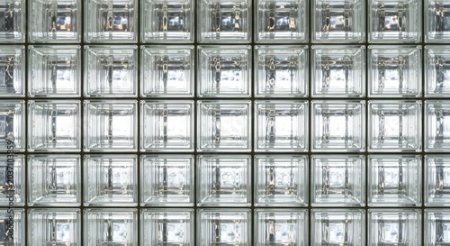 A seamless glass block wall texture featuring clear transparency, soft light refraction, and elegant reflections on geometric surfaces, backdrop, decorative, geometric