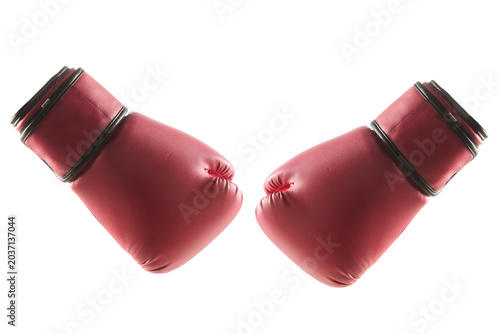 Foto Red boxing glove hangs suspended mid-air