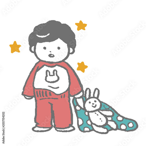 ぬいぐるみを持ったパジャマ姿の男の子