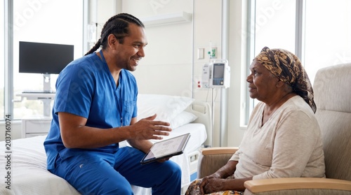 Indigenous Male Nurse Elder Patient Home Visit Tablet Consultation