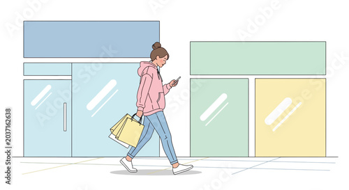 Young woman with shopping bags using smartphone while walking past storefronts